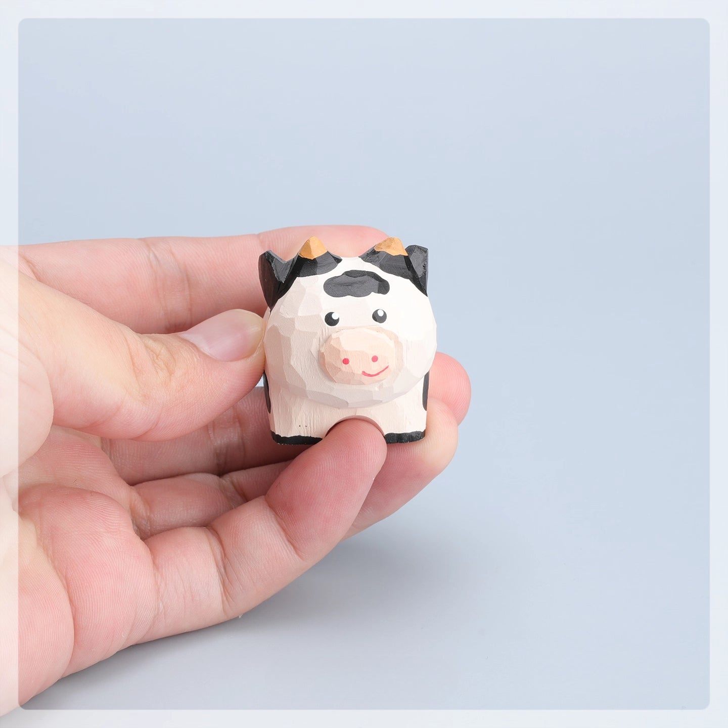 Gohobi Hand-Carved Wooden Cow Figurine