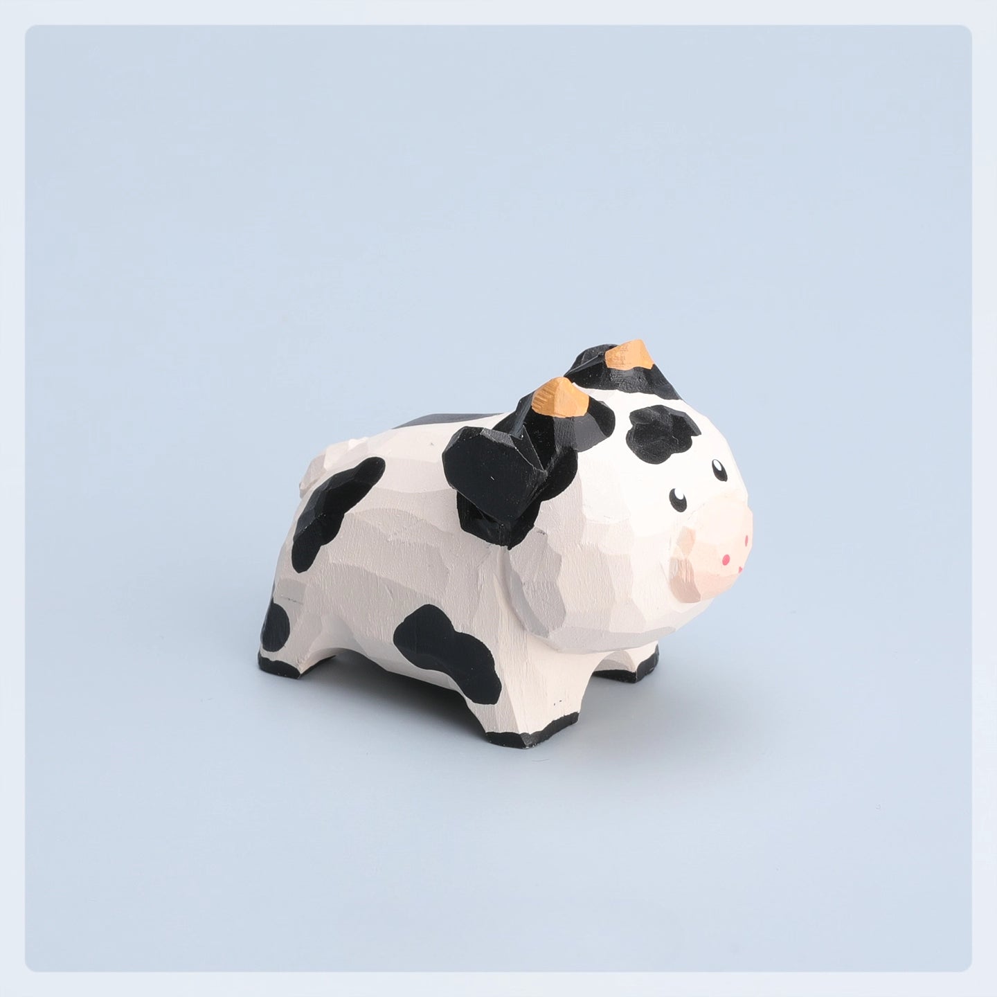 Gohobi Hand-Carved Wooden Cow Figurine
